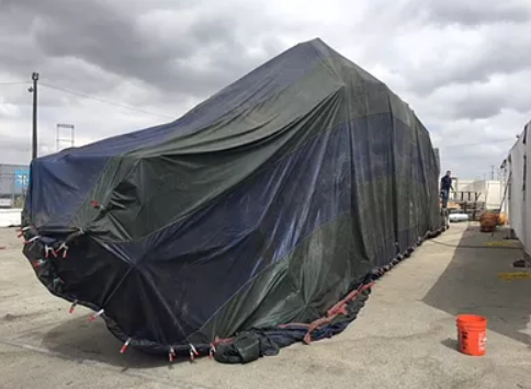 Tarpaulin fumigation of large cargo